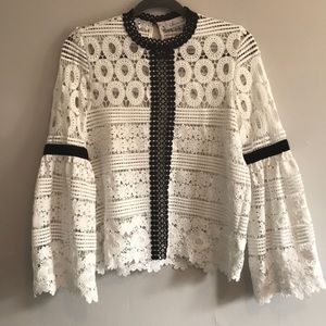 Lace blouse with bell sleeves